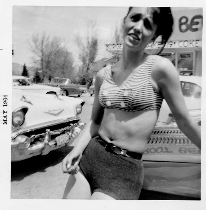 Customers enjoying Mark's Beefburgers at the original walk-up drive-in in Livingston Montana